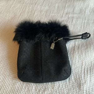 Coach wristlet with real fur. Like new!